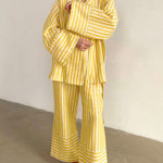 Yellow striped button-front top with matching wide-leg trousers