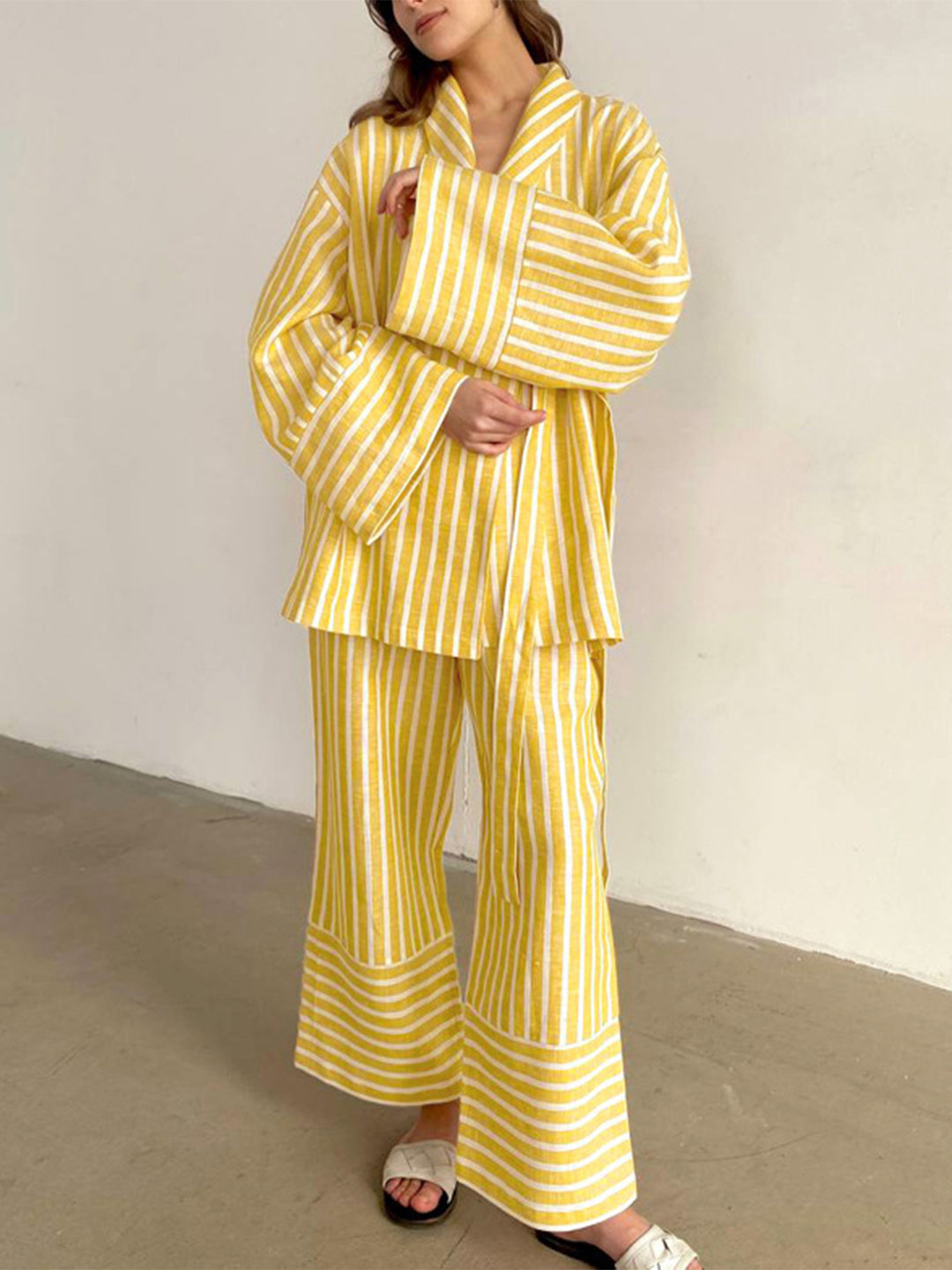 Yellow striped two-piece lounge set: shirt top and wide-leg trousers