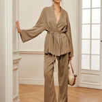 Women’s khaki wrap blouse and wide-leg pants set with waist belt tie, full length