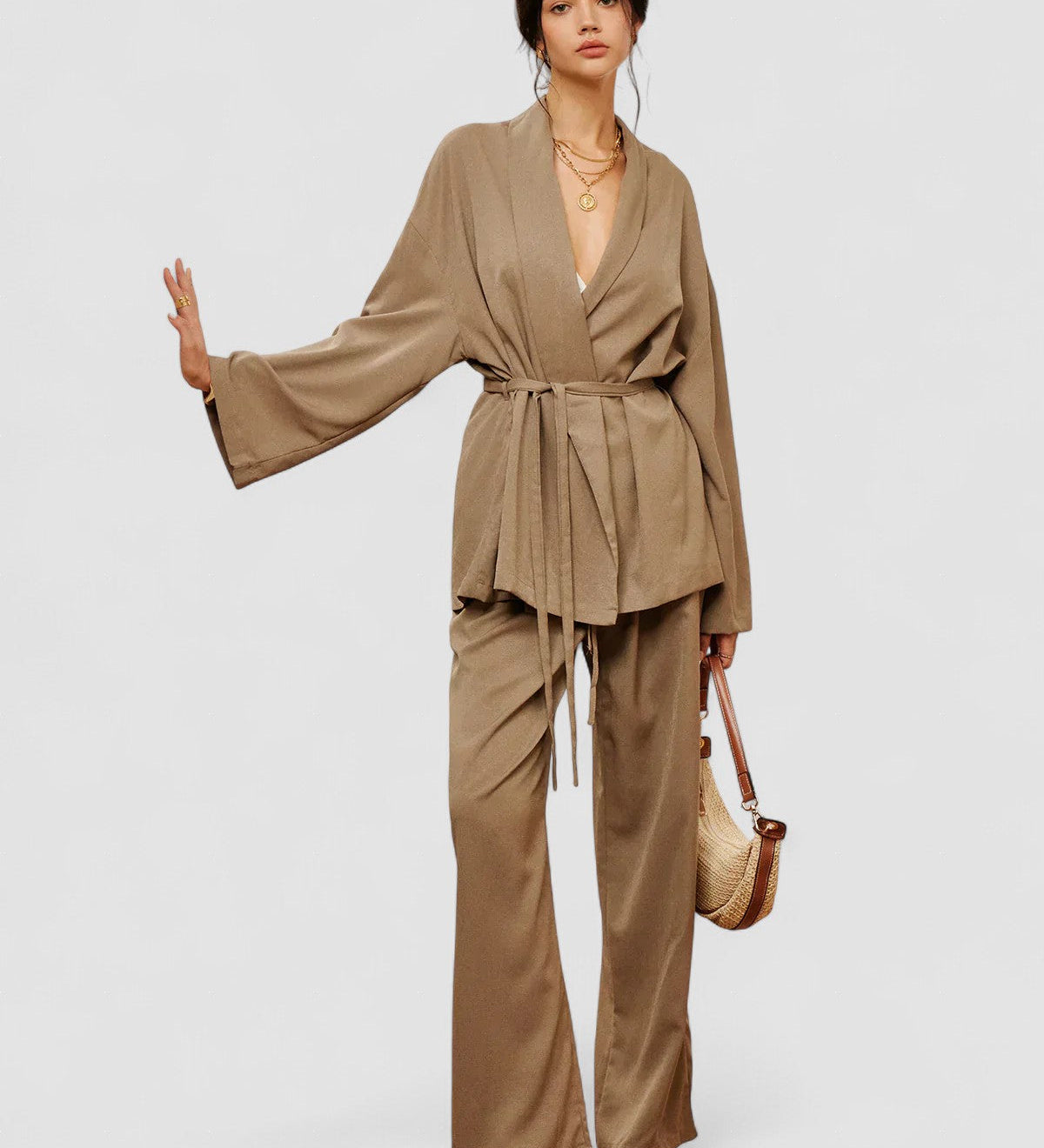 Women’s khaki wrap blouse and wide-leg pants set with waist belt ties