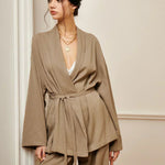 Women’s khaki wrap blouse and wide-leg trousers set with waist belt tie