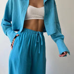 Teal-blue collared button-up shirt and matching drawstring waist pants set