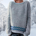 Striped knit sweater with crew neck, long sleeves, ribbed cuffs and hem, blue trim at bottom