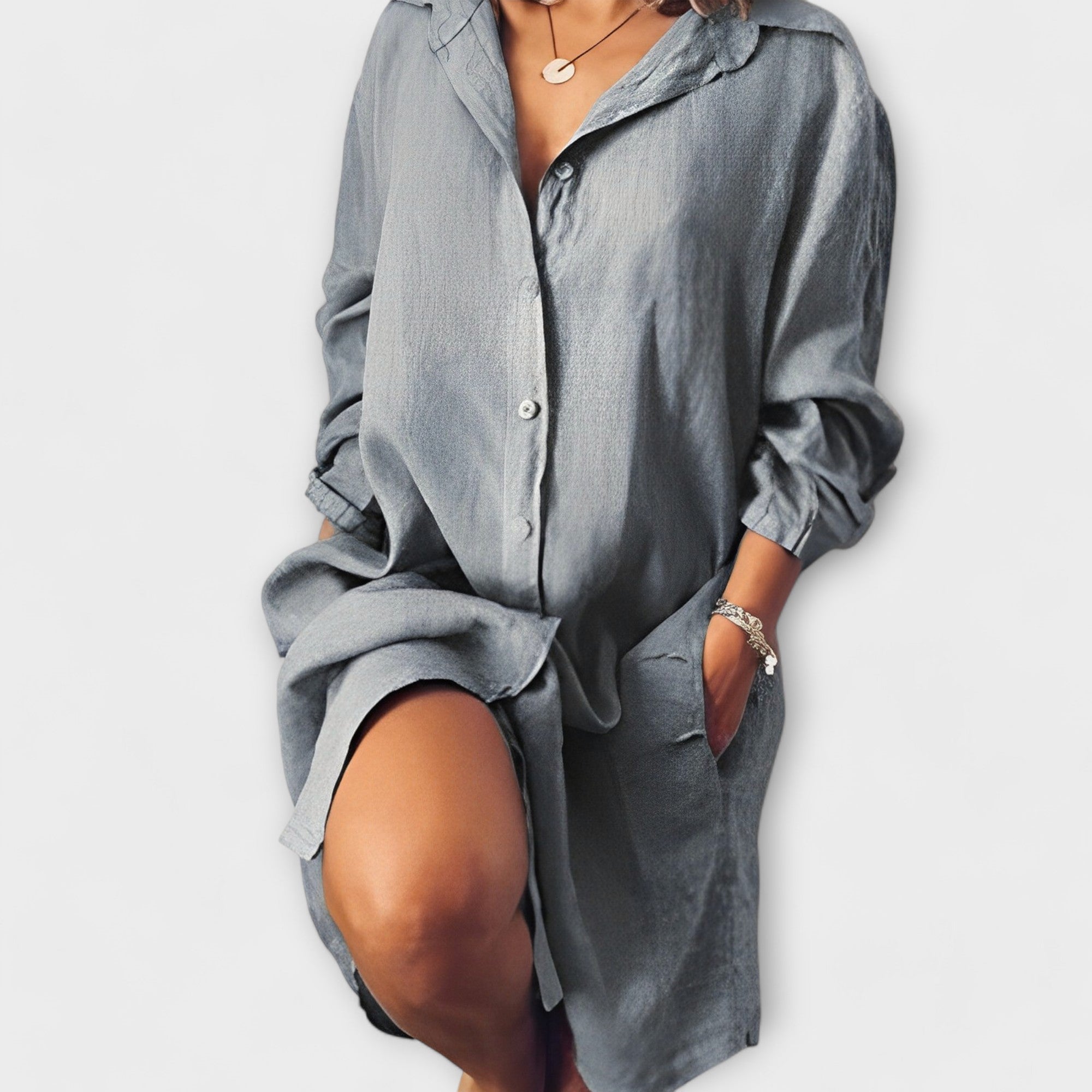 Loose linen shirt-dress, dark gray-blue, button-front, point collar, long sleeves, relaxed fit.