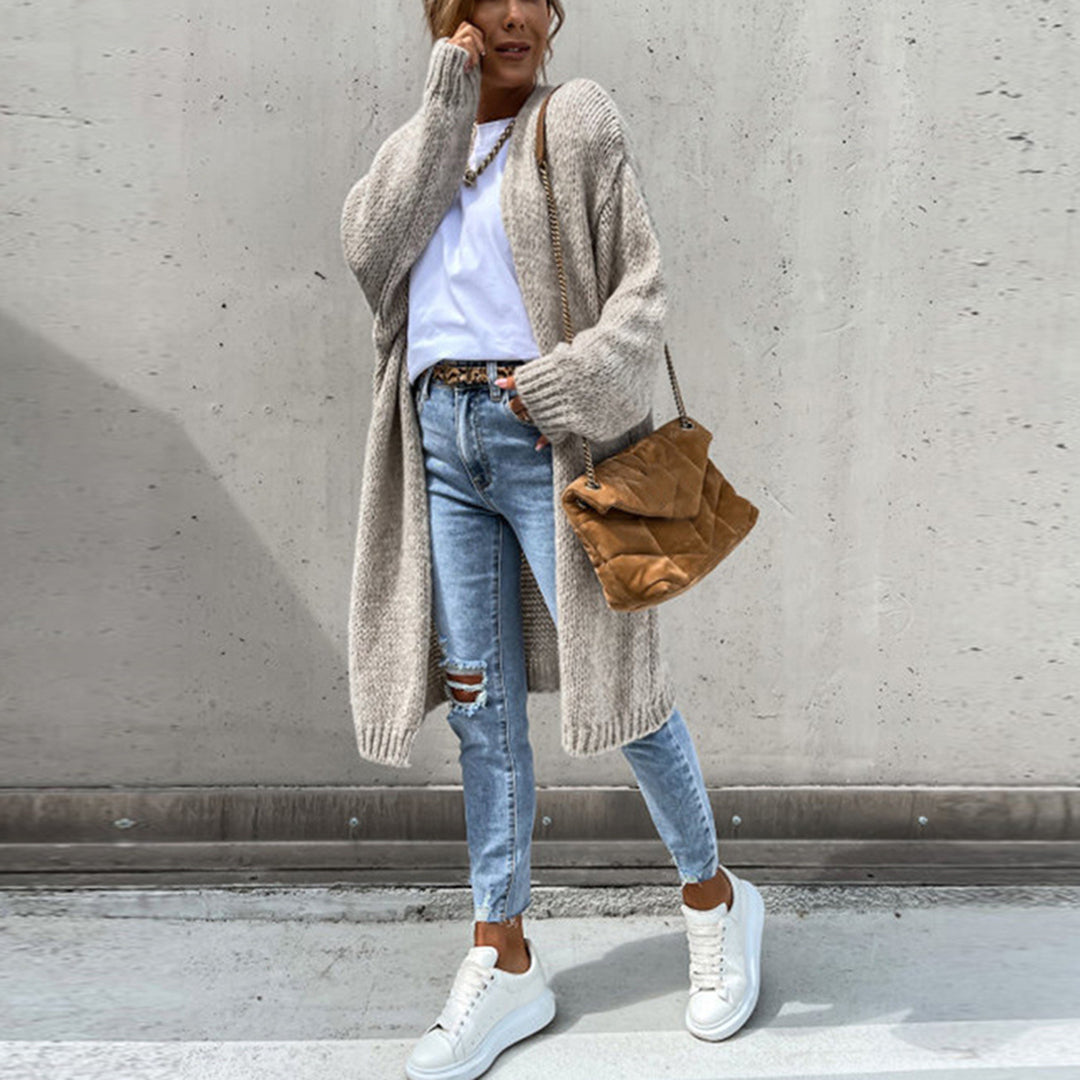 Long taupe knit cardigan, open front, long sleeves with ribbed cuffs and hem.
