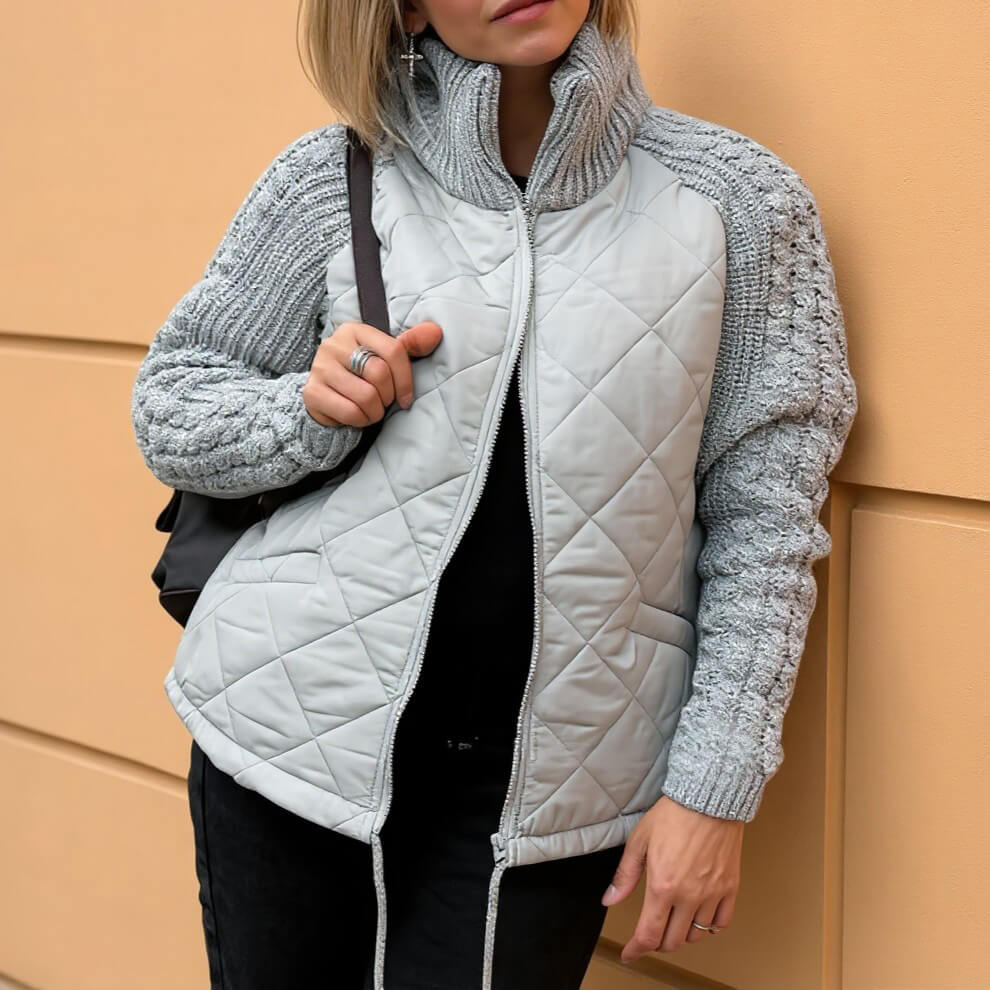 Quilted patchwork zip-up jacket with ribbed knit sleeves, light gray quilted front