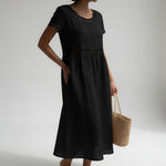 Black embroidered midi dress with round eyelet-trim neckline and short sleeves
