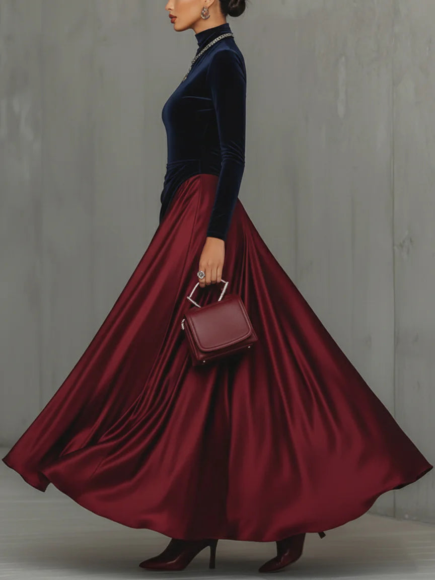 Two-tone long dress: navy fitted bodice and full red satin skirt with diagonal panel
