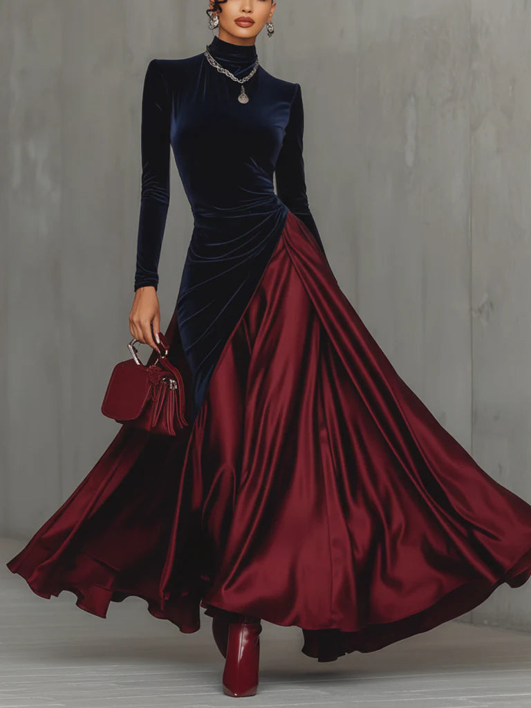 Two-tone long dress with navy fitted long sleeves and red satin A-line skirt, diagonal drape