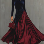 Two-tone long dress with navy fitted long sleeves and red satin A-line skirt, diagonal drape