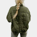Dark green quilted puffer jacket back view with full-length center back zipper
