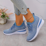 Light blue knit lace-up platform sneakers with breathable texture and thick cushioned sole
