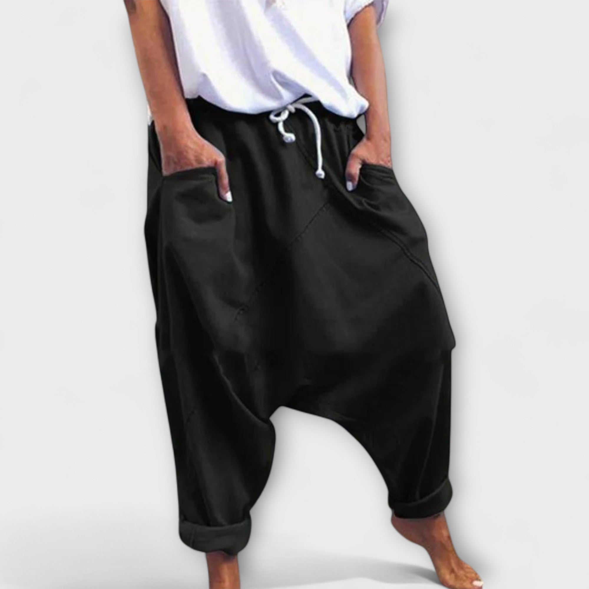 Wide-leg harem pants with drawstring waist, black, side pockets.