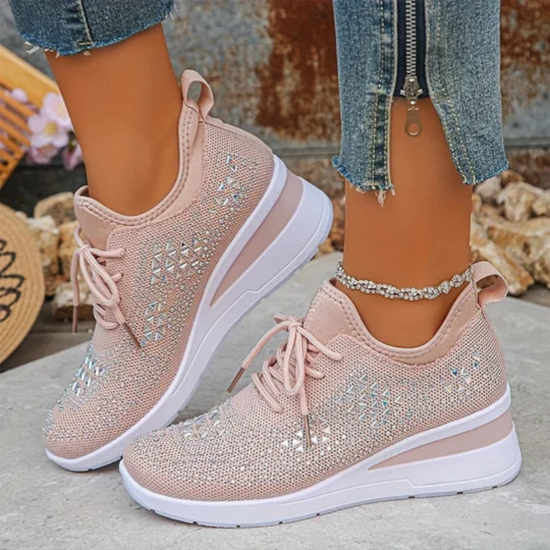 Blush pink knit lace-up platform sneakers with breathable texture and thick cushioned sole