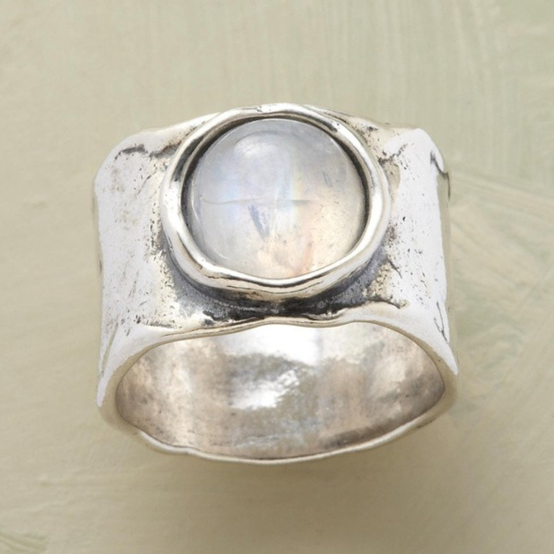 Boho moonstone cabochon ring in silver-tone metal, wide band with textured sides