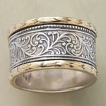 Two-tone vintage ring with engraved silver filigree and gold center stripe
