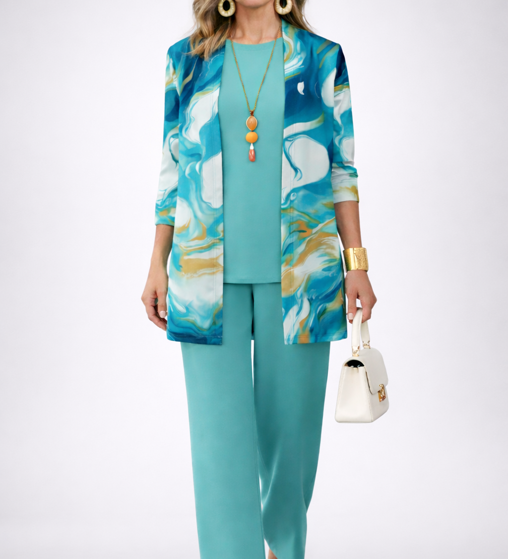 Three-piece teal set with printed longline jacket, tank top, and wide-leg pants