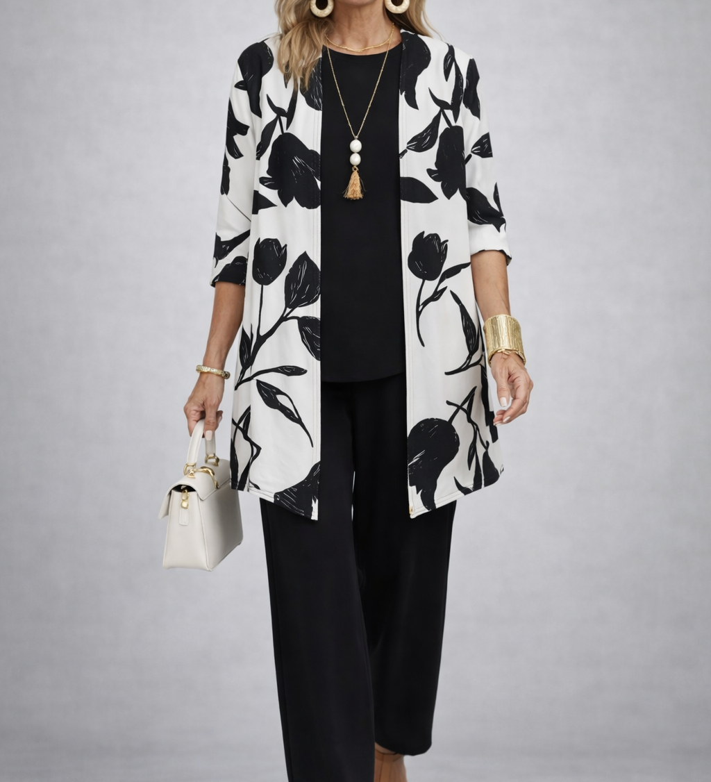 Three-piece outfit set: black floral kimono jacket, black top, black trousers, front view