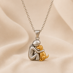 Hugging cat pendant necklace, silver-tone charm with gold-tone cat and linked chain