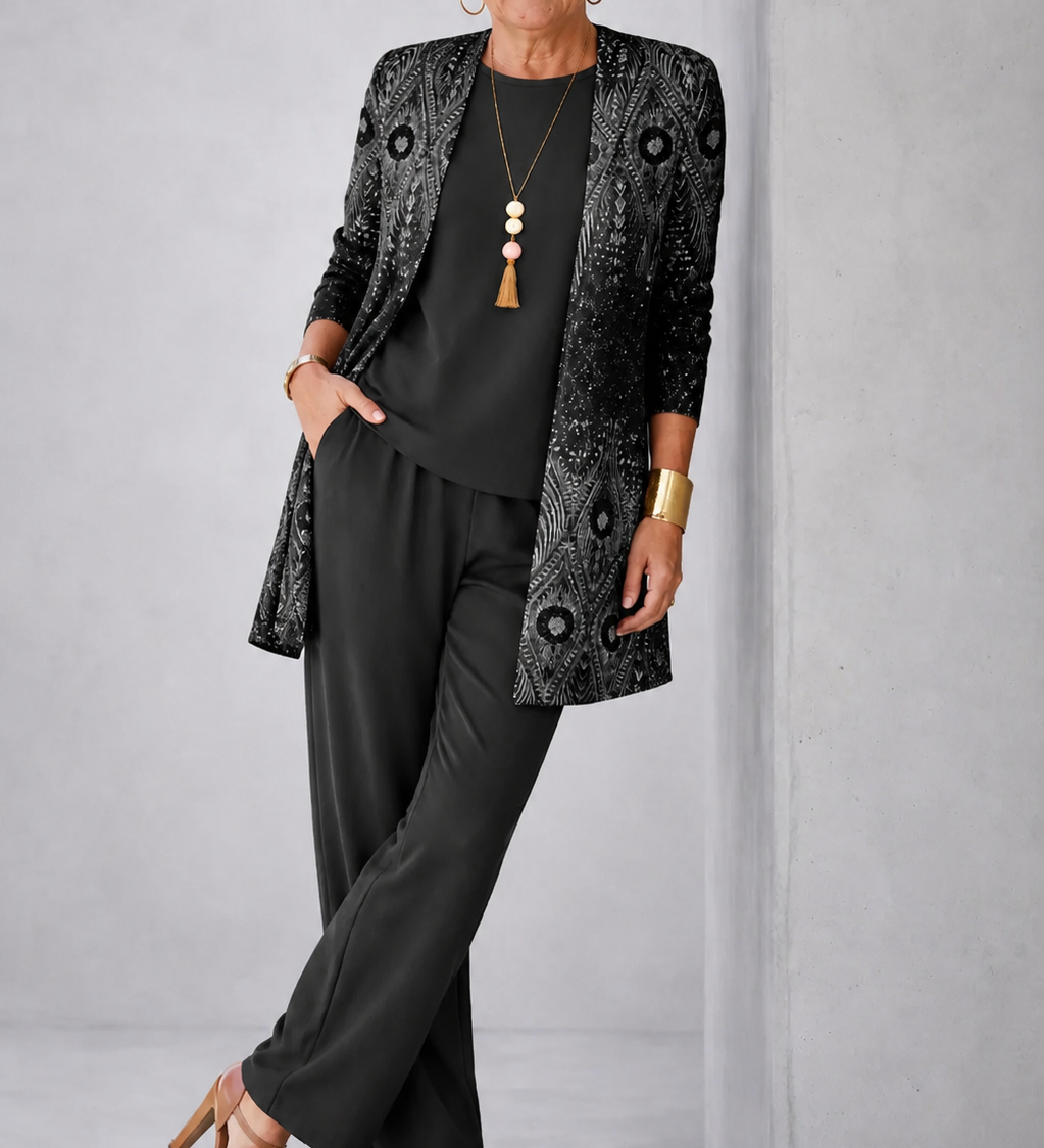 Black three-piece set: patterned 3/4-sleeve jacket, long top and wide-leg pants
