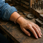 Doina Bucaresti copper twist bracelet on wrist