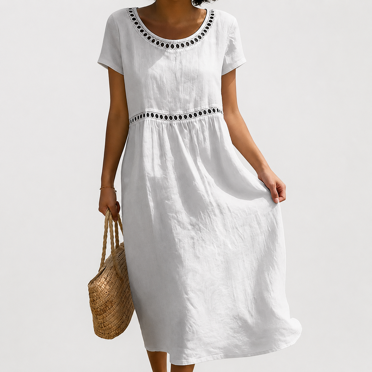 White embroidered midi dress with round eyelet-trim neckline and short sleeves