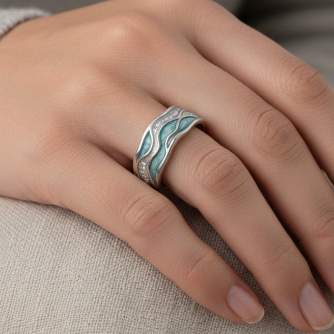 Silver ring with turquoise wave inlay on fingers, slim band with wavy texture