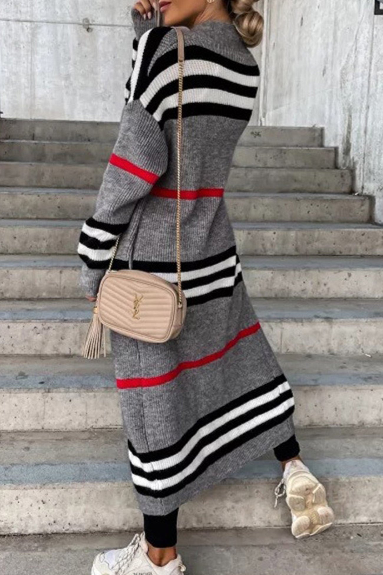 Long gray cardigan with black-and-white horizontal stripes and red stripe border.