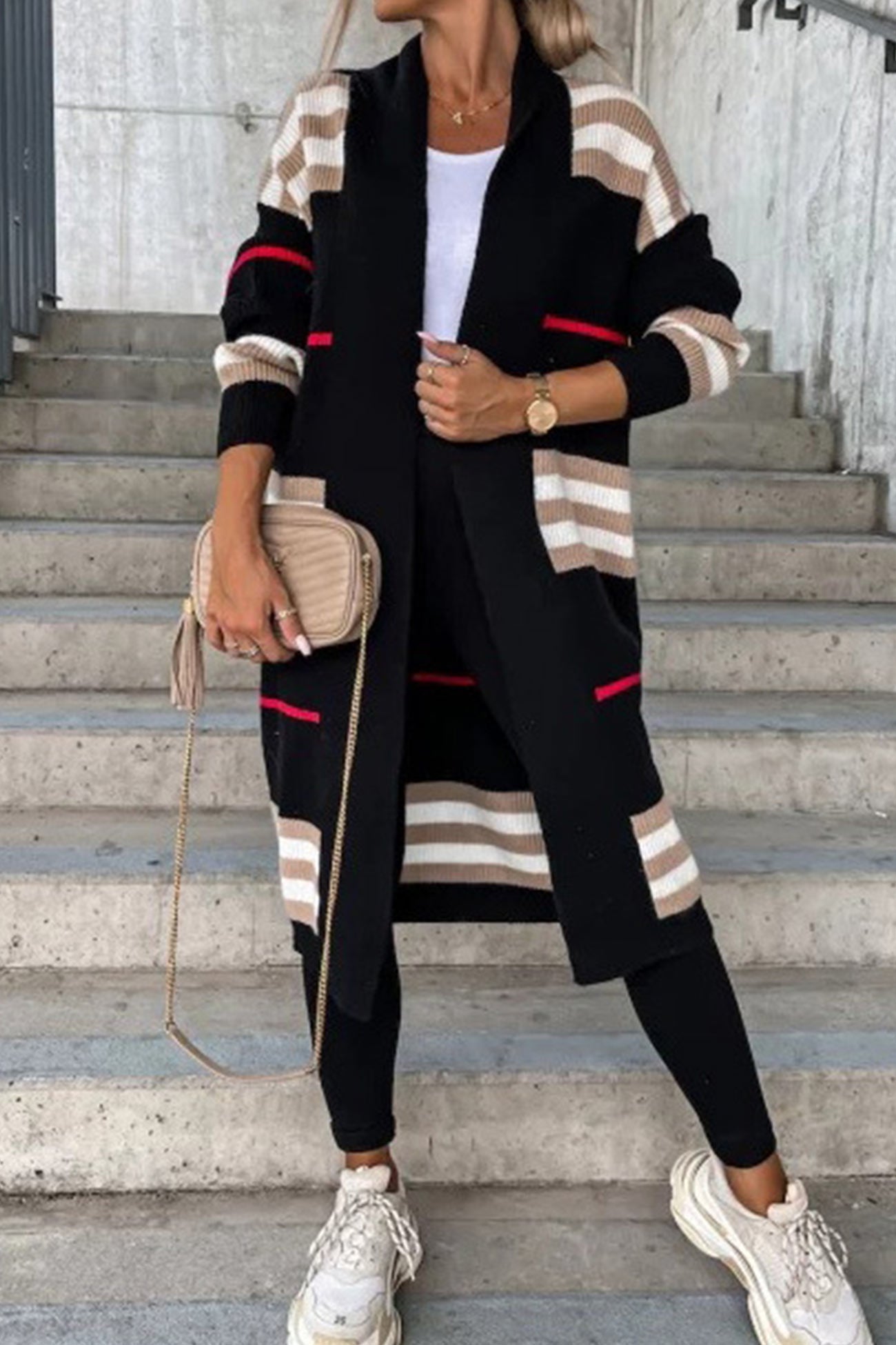 Long cardigan with black base, beige horizontal stripes, and red accent lines.