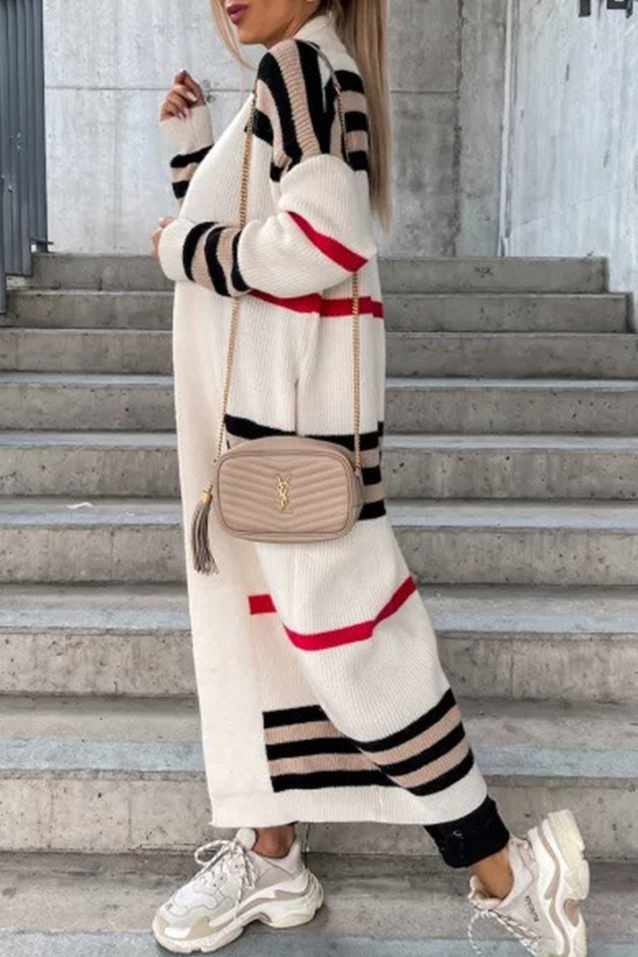 Long knit cardigan in cream with black stripe bands and red accents
