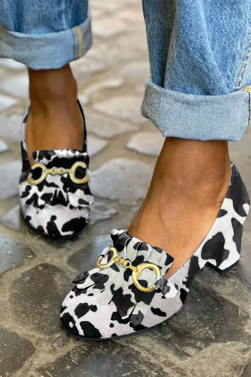 Cow-print heeled clog with gold-tone buckle detail and block heel