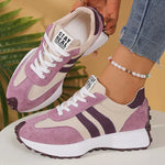Lavender suede-look lace-up sneakers with white stripes and stay real tag, chunky sole