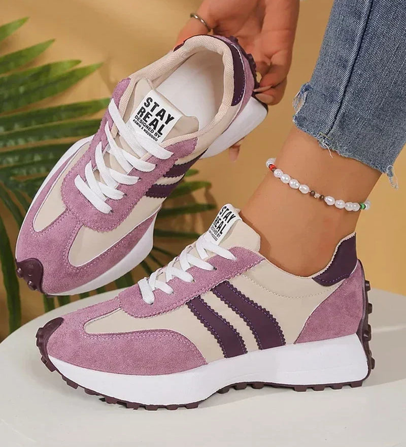 Lavender suede-look lace-up sneakers with white stripes and stay real tag, chunky sole