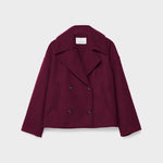 Burgundy double-breasted coat with wide lapels and button front.