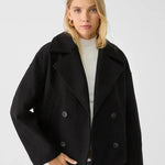 Black double-breasted coat with wide lapels and silver button detail.