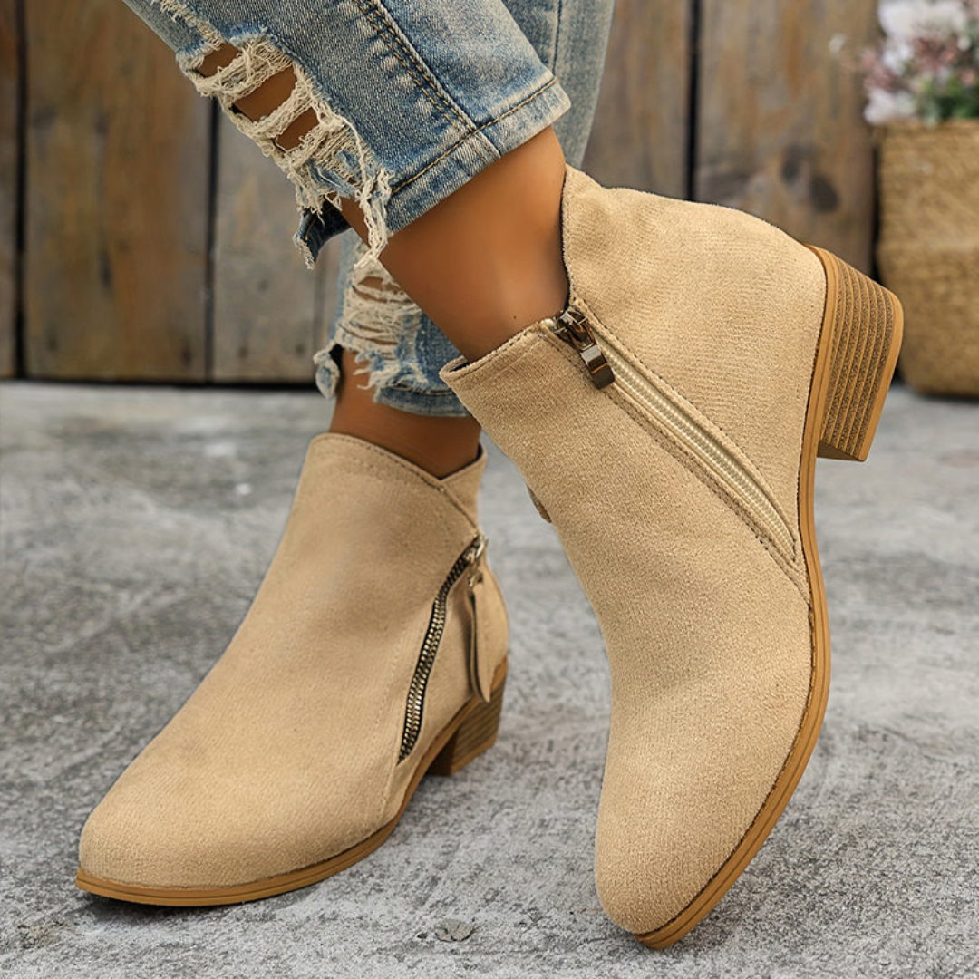 Beige orthopedic ankle boots with side zipper and block heel