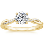 Juana gold ring with round center stone and pavé band