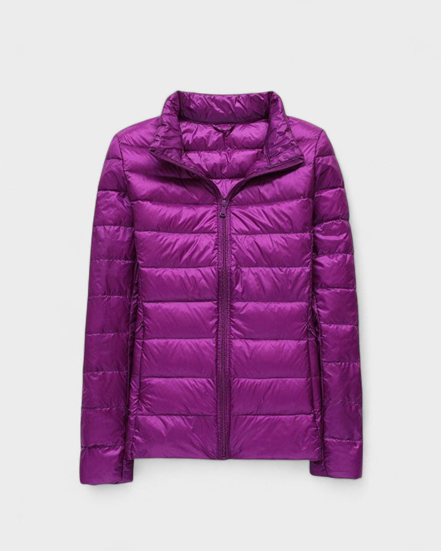 Purple quilted puffer jacket with full-length zipper and high collar