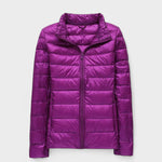 Purple quilted puffer jacket with full-length zipper and high collar