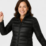 Black puffer jacket with full front zipper and stand collar, quilted insulation.