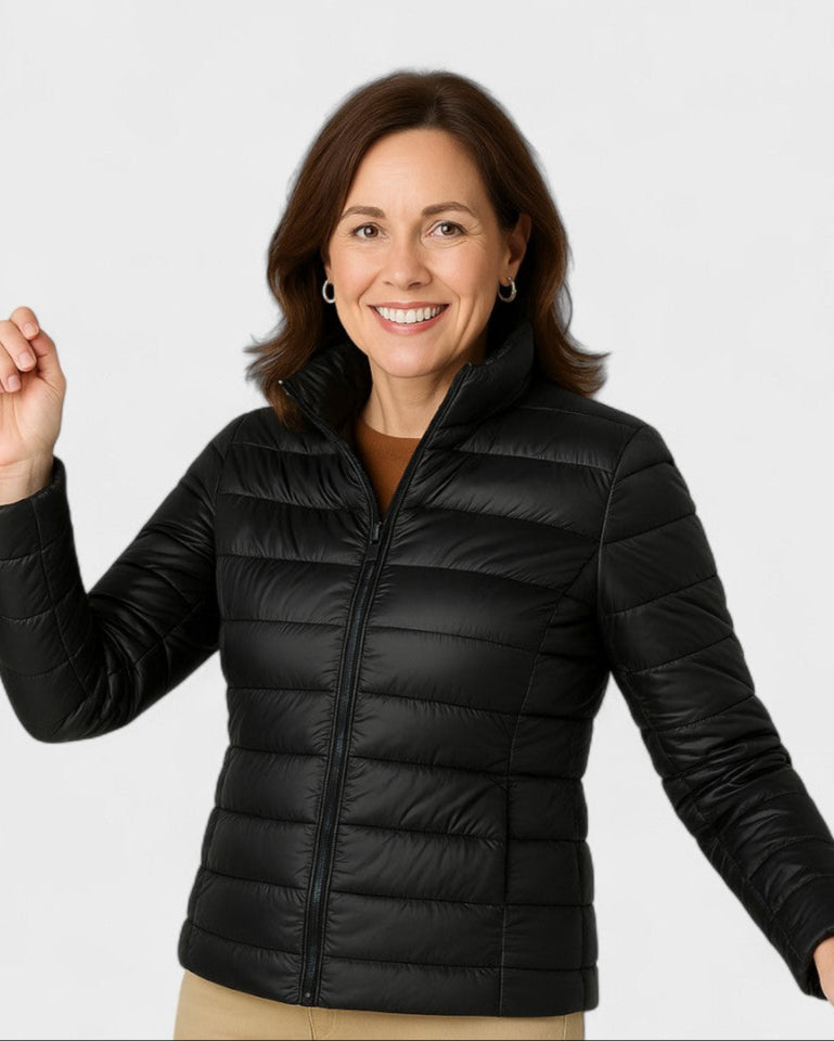 Black puffer jacket with full front zipper and stand collar, quilted insulation.