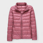 Mauve/pink puffer jacket with full front zipper and high stand collar.