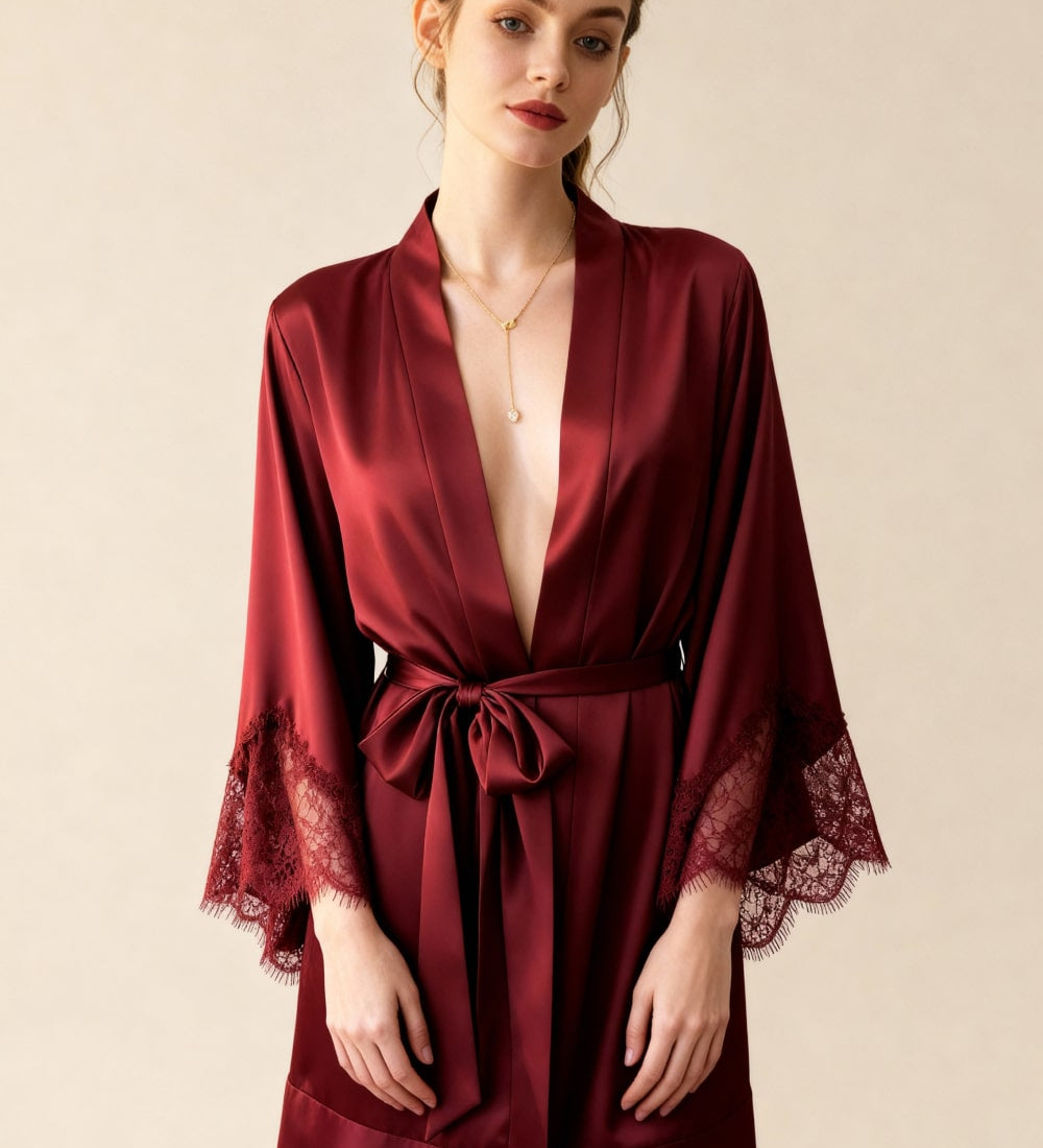 Red satin short robe with deep V neckline, lace-trim sleeves and tie belt