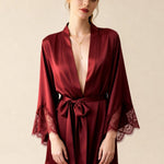 Red satin short robe with deep V neckline, lace-trim sleeves and tie belt