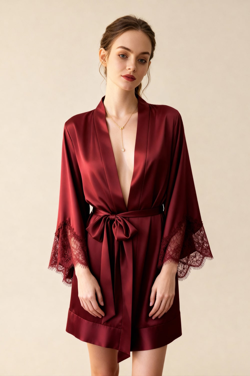 Red satin short robe with deep V neckline, lace-trim sleeves and tie belt