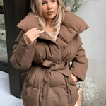 Brown oversized puffer jacket with hood and wide tie belt, front snaps