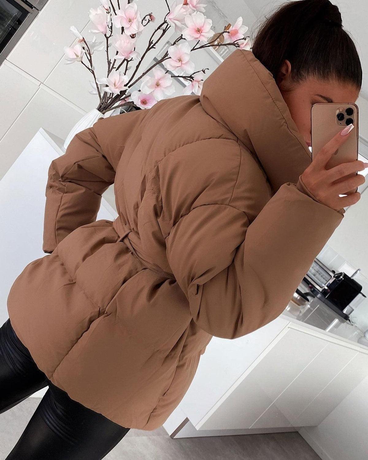 Tan-brown oversized puffer jacket with hood and tie belt, button front