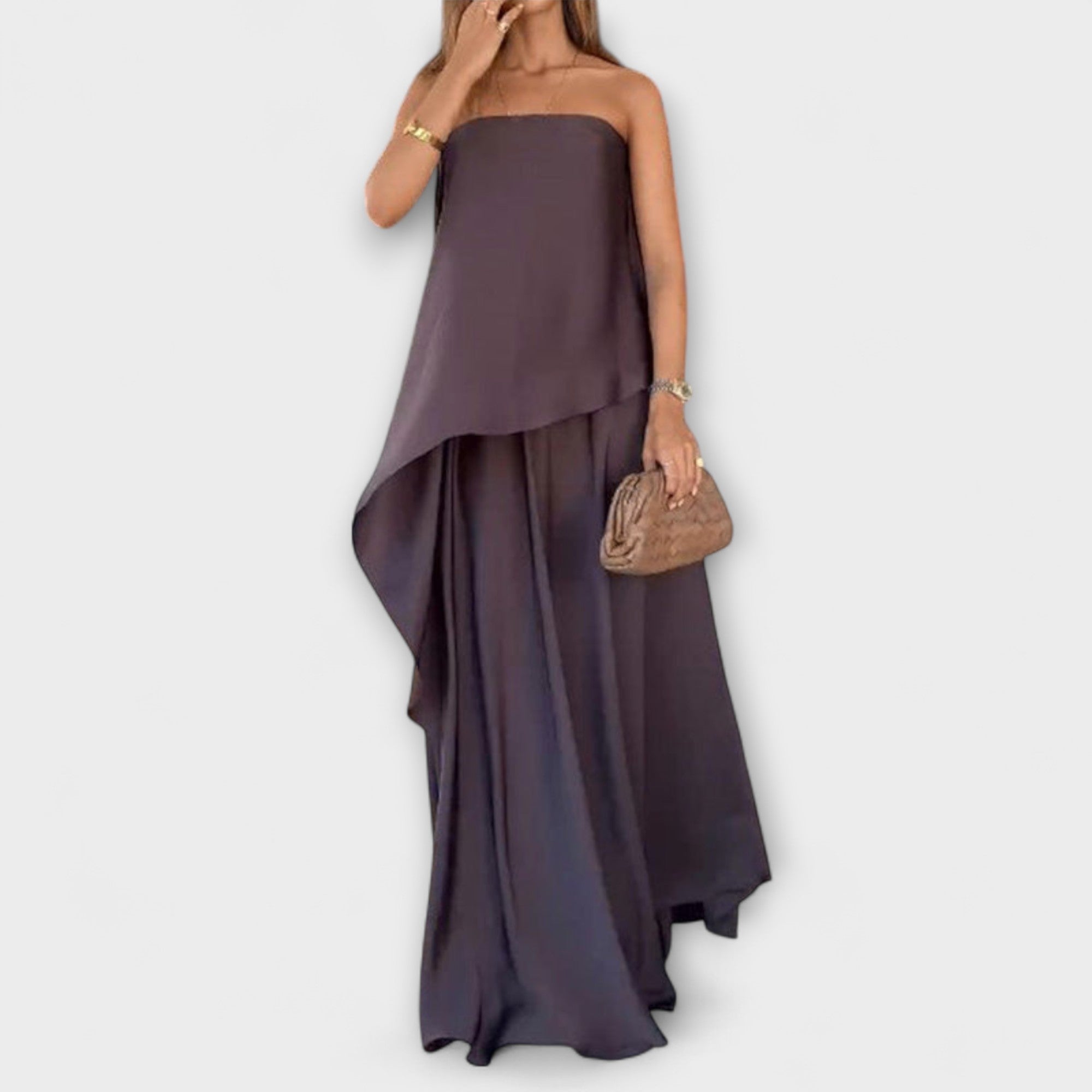 Strapless dark plum layered maxi dress with draped bodice and flowing skirt