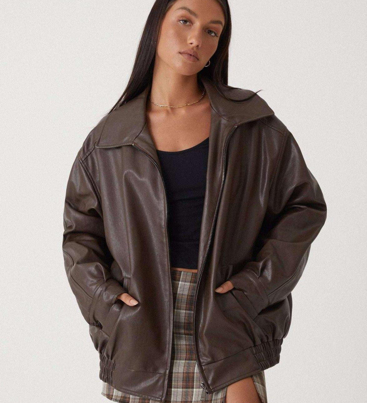 Florence brown leather jacket on model, front zip closure and stand collar