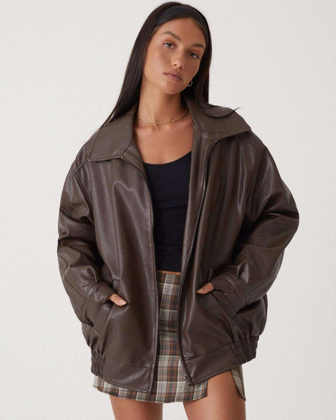 Florence brown leather jacket on model, front zip closure and stand collar